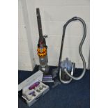 A DYSON DC50 UPRIGHT VACUUM (needs attention) with attachments and boxed Dyson party clean-up kit