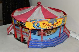 A SCRATCHBUILT WOODEN WORKING MODEL OF A NOAH'S ARK CAROUSEL, traditional style carousel which has