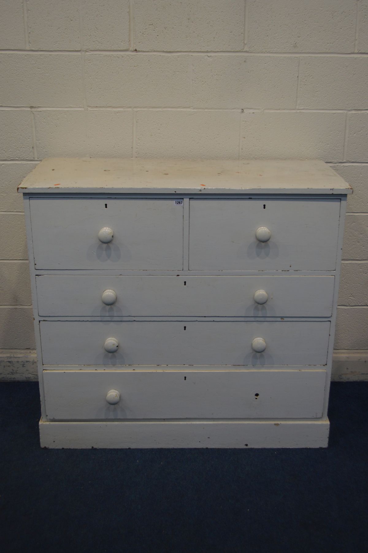 A MID VICTORIAN WHITE PAINTED PINE CHEST OF TWO SHORT DEEP OVER THREE LONG GRADUATED DRAWERS,