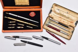 A CASED CHRONICLE FOUTAIN PEN SET AND OTHER PENS, the wooden case set includes a yellow and white