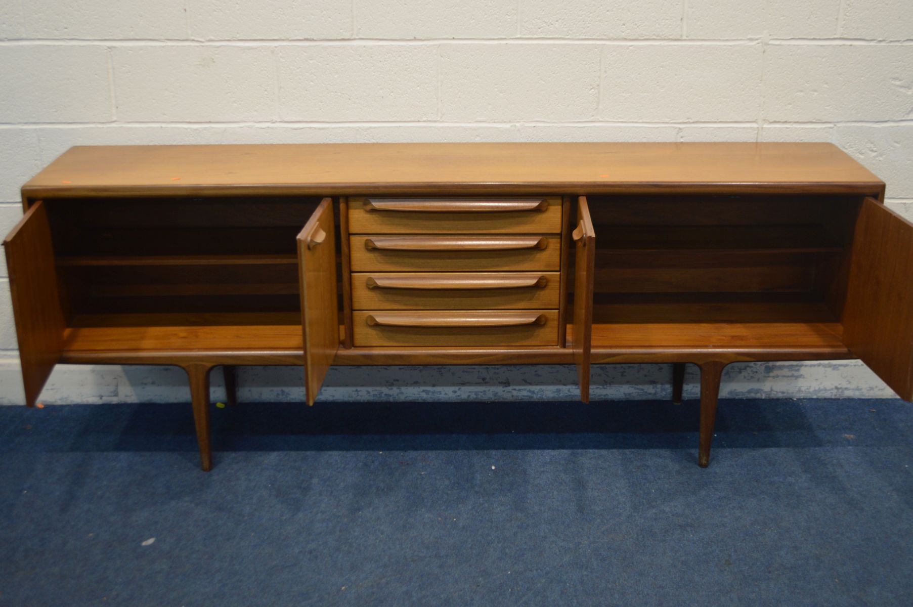 JOHN HERBERT FOR YOUNGER, A 1960'S TEAK 7FT SIDEBOARD, with double cupboard doors flanking four - Image 3 of 5