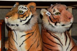 TWO MODERN SOFT TOY TIGERS POSED IN RECUMBENT POSITIONS, overall lengths including tails