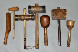 A TRAY CONTAINING SEVEN VINTAGE MALLETS comprising of a Lignum Vitae headed carvers mallet, a Bell