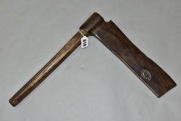 AN UNUSUAL LEROUX AXE WITH THE CUTTING EDGE AT THE TOP, 11'' edge, 15'' in length