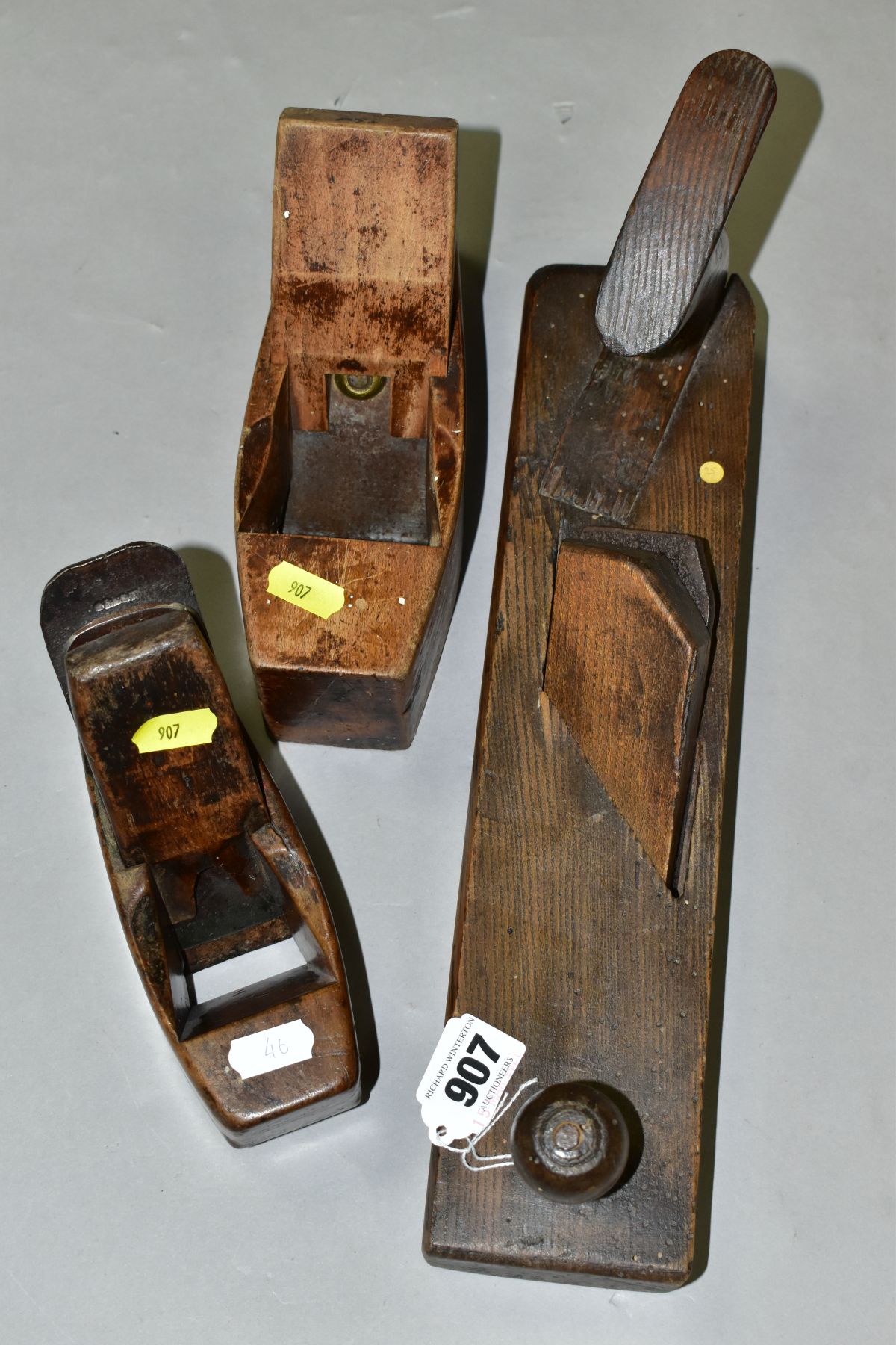 THREE VINTAGE WOODEN PLANES comprising of a 14'' with an angled blade, a 8'' coffin by Atkins and - Image 5 of 9