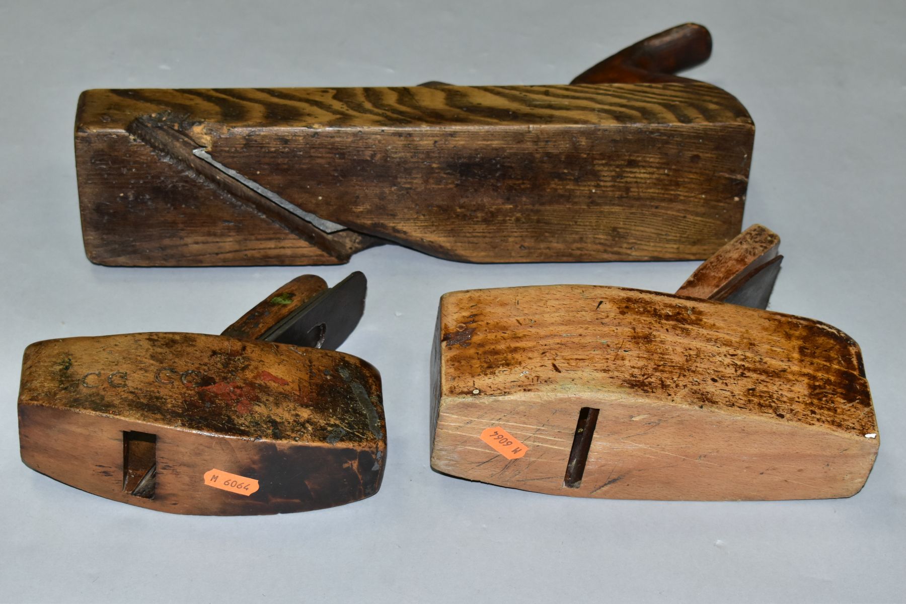 THREE VINTAGE WOODEN PLANES comprising of a 14'' with an angled blade, a 8'' coffin by Atkins and - Image 7 of 9