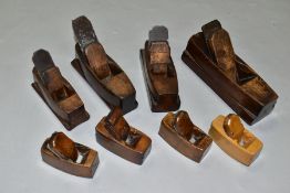 A SMALL TRAY CONTAINING MINIATURE WOOD PLANES including a 15/16'' coffin plane with a carved