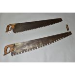 TWO VINTAGE CROSS CUT SAWS, one by Disstons, 37'' long, the other twin handled, 42'' long (2)