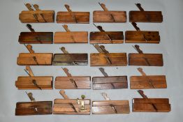 A TRAY CONTAINING TWENTY MOULDIING PLANES by makers such as Cannadine, Holbrook, T.Hall of