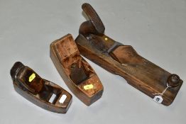 THREE VINTAGE WOODEN PLANES comprising of a 14'' with an angled blade, a 8'' coffin by Atkins and