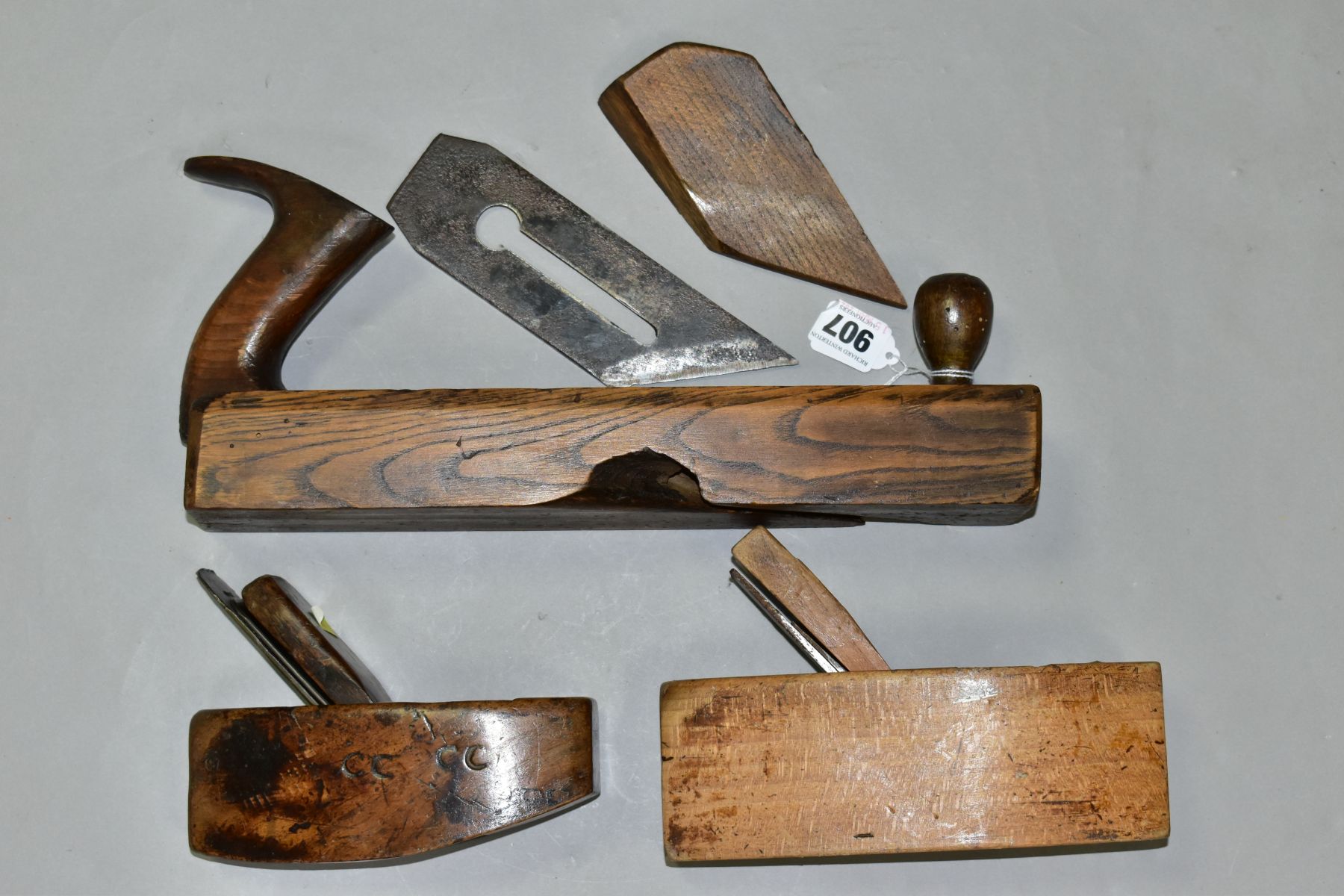 THREE VINTAGE WOODEN PLANES comprising of a 14'' with an angled blade, a 8'' coffin by Atkins and - Image 8 of 9