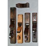 A BOX CONTAINING FOUR VINTAGE WOODEN PLANES including one at 22'' with a Marples iron, a 17'' with