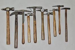 A SMALL TRAY CONTAINING TEN SPECIALIST HAMMERS, including upholsterers hammers, veneers hammers,