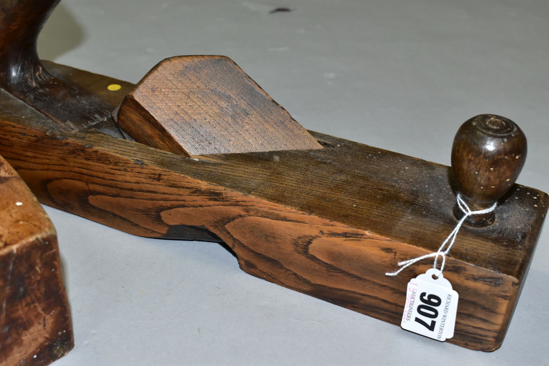 THREE VINTAGE WOODEN PLANES comprising of a 14'' with an angled blade, a 8'' coffin by Atkins and - Image 3 of 9