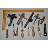 THIRTEEN ITEMS OF VINTAGE CARPENTRY TOOLS including a 20'' brass and wood Tailors square, a J S Fray