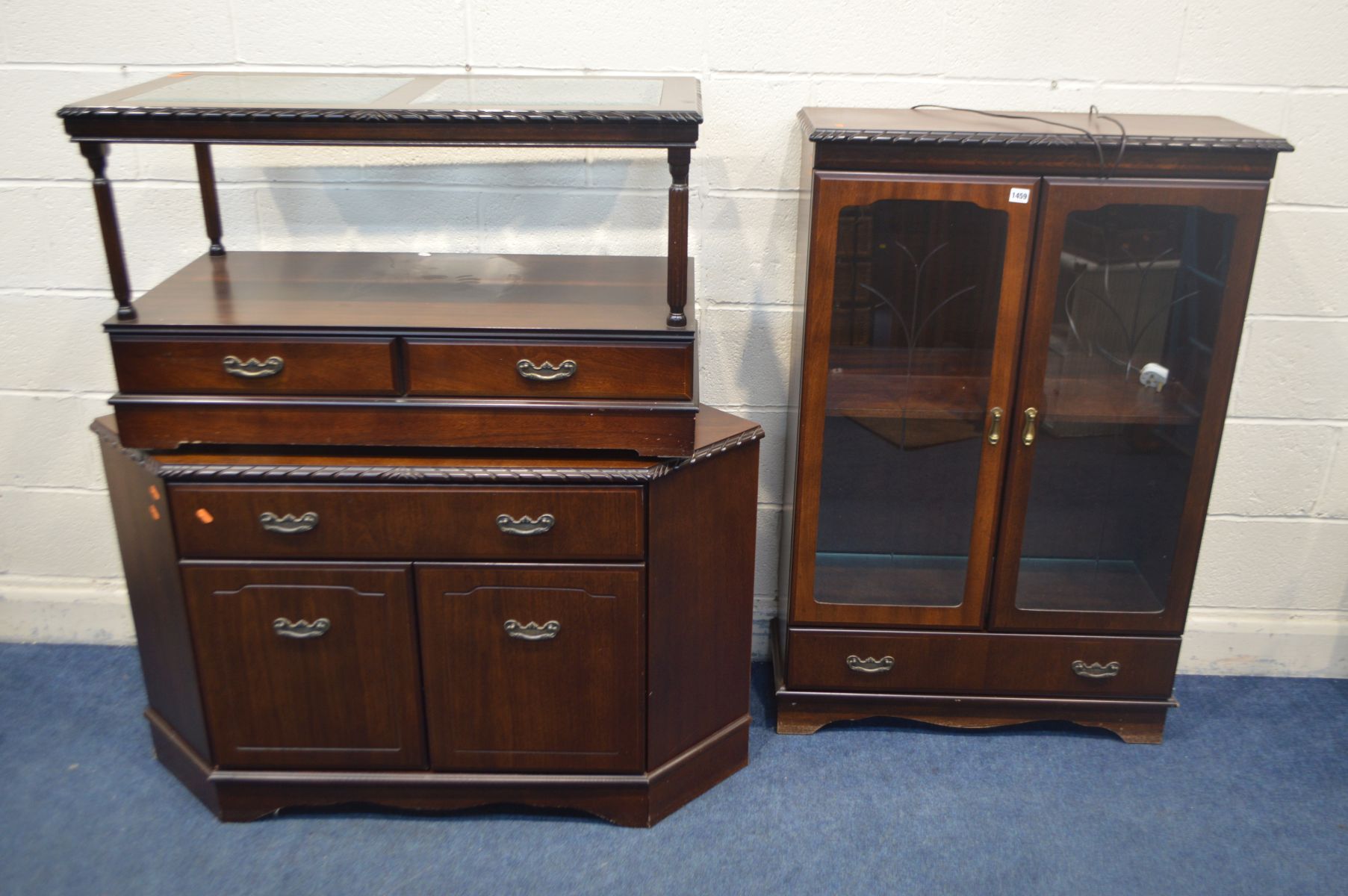 A MODERN MAHOGANY GLAZED DOUBLE DOOR BOOKCASE, along with a corner cupboard and a glass topped