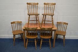 A BEECH AND TILE TOPPED KITCHEN TABLE, length 119cm x depth 74cm x 75cm and six chairs (Sd to