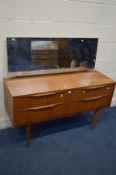 AUSTINSUITE, A TEAK SIDEBOARD/DRESSING CHEST OF FOUR DRAWERS, with a single rectangular mirror,