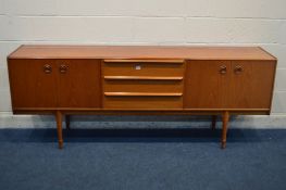 A MCINTOSH TEAK 7FT SIDEBOARD, with circular brass handles, two double cupboard doors flanking three