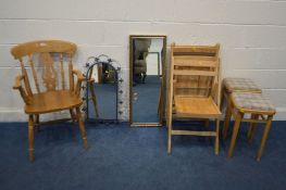 A BEECH ARMCHAIR, along with three folding beech chairs, four wall mirrors, and two stools (9)