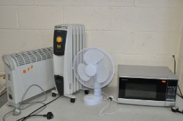 A SHARP MICROWAVE, a Challenge Desk Fan, a Winterwarm heater and a De'Longhi Heater (4) ( all PAT