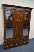 AN EDWARDIAN MAHOGANY AND INLAID MIRRORED DOUBLE DOOR WARDROBE, above two drawers, width 157cm x