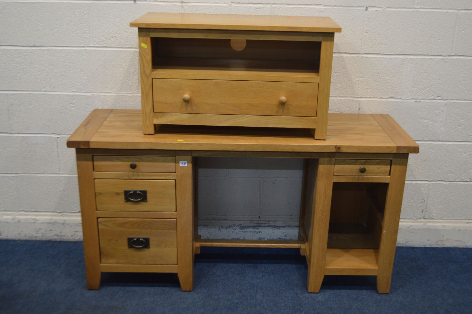 A GOLDEN OAK DESK with four assorted drawers, width 150cm x depth 50cm x height 77cm along with an