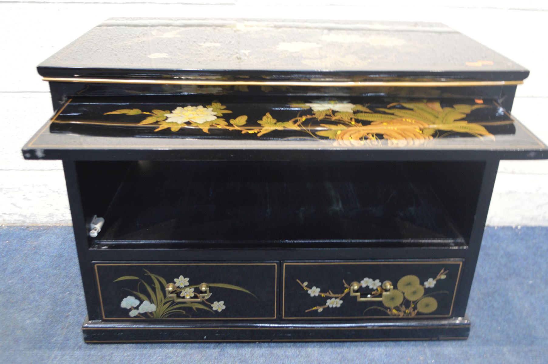 A CHINESE EBONISED AND CHINOISERIE TV CABINET, with a fall front door and two drawers, width 81cm - Image 3 of 3