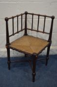 A WILLIAM MORRIS STYLE BEECH AND RUSH SEATED CORNER CHAIR