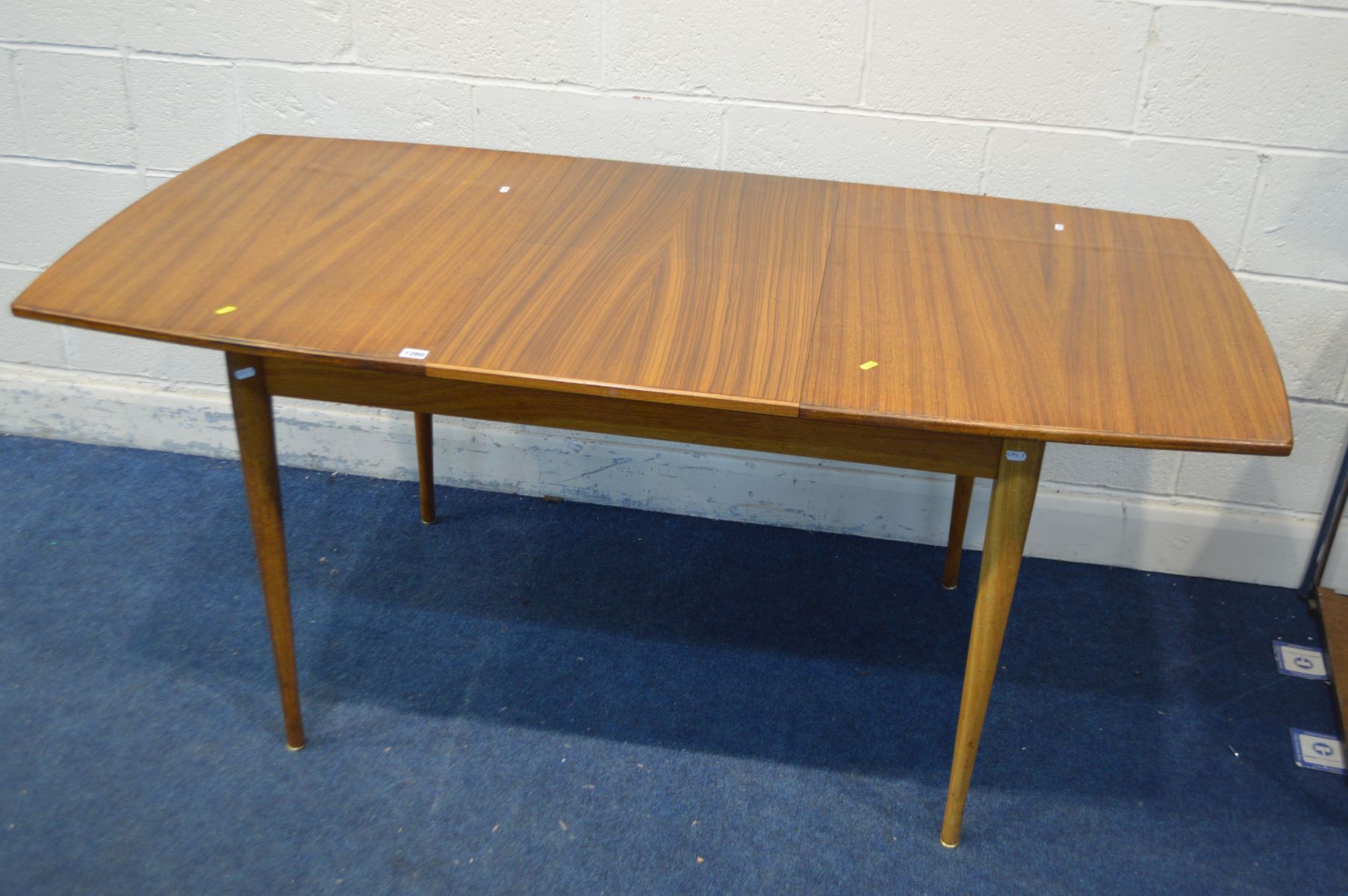 A 1950'S/60'S AFROMOSIA EXTENDING TABLE, with a single additional fold out leaf, extended length - Image 4 of 4