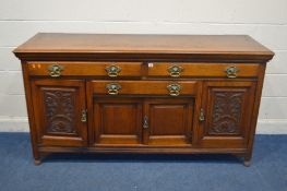 AN EDWARDIAN OAK SIDEBOARD, with three various drawers and impressive large brass handles, width