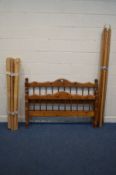 A PINE 4FT6 BEDSTEAD, with side rails and slats