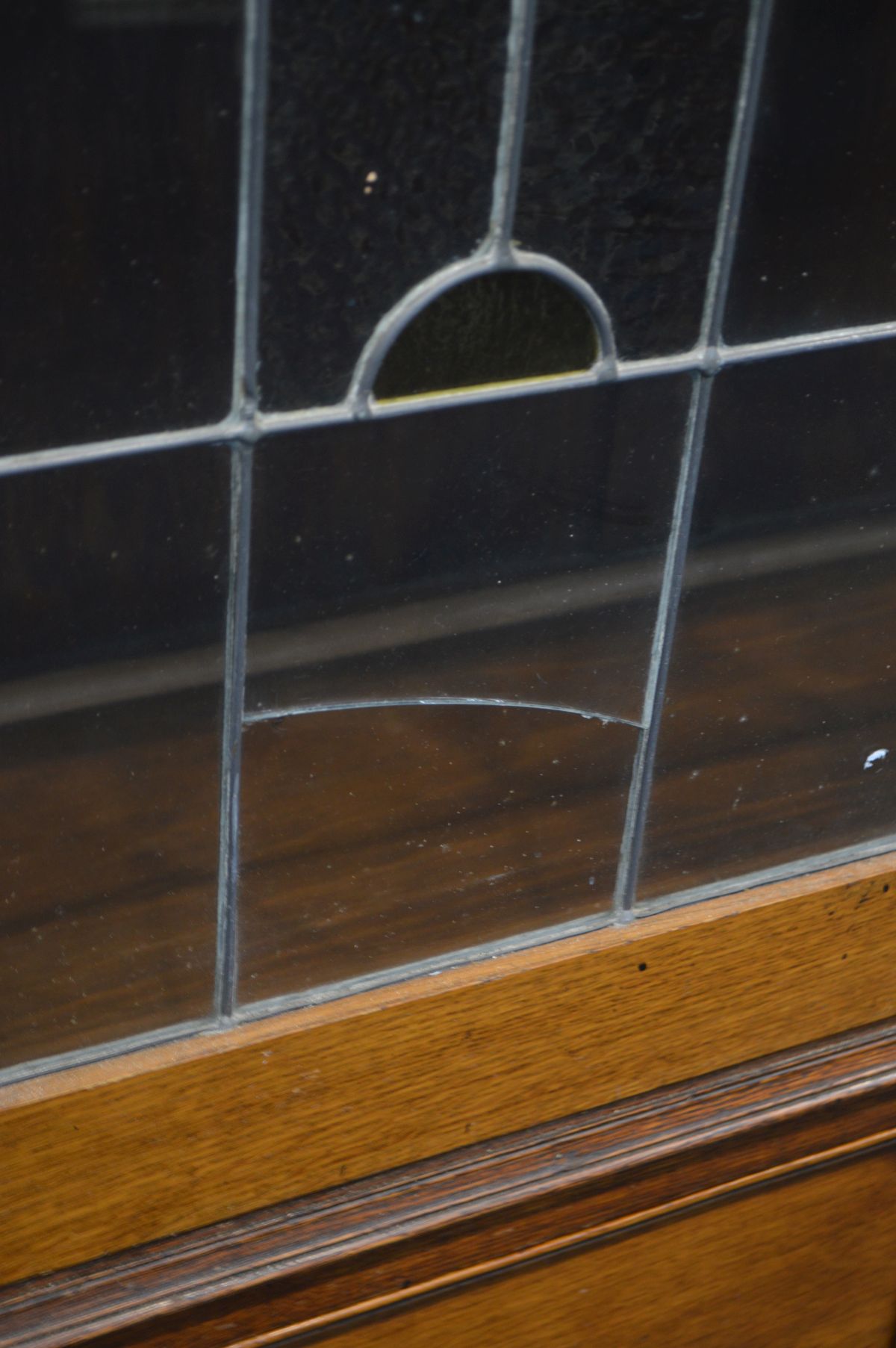 AN EARLY TO MID 20TH CENTURY OAK LEAD GLAZED ART NOUVEAU BOOKCASE, with two drawers on barley - Image 6 of 6