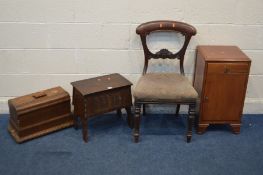 A CARVED OAK STORAGE CHEST, along with a jones walnut sewing machine, period mahogany chair and a