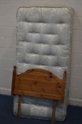 A SINGLE DIVAN BED, mattress and pine headboard