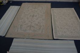 TWO LAURA ASHLEY FOLIATE RUGS, largest rug with damaged end, 236cm x 165cm, 181cm x 117cm along with