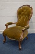 A VICTORIAN WALNUT SPOON BACK ARMCHAIR on scrolled front legs (Sd and loose joints)