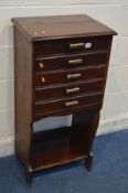 AN EDWARDIAN MAHOGANY FIVE DRAWER MUSIC CABINET, with later handles, width 50cm x depth 35cm x