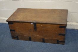 A 20TH CENTURY HARDWOOD AND IRON BOUND TRUNK, with drop handles, width 110cm x depth 56cm x height