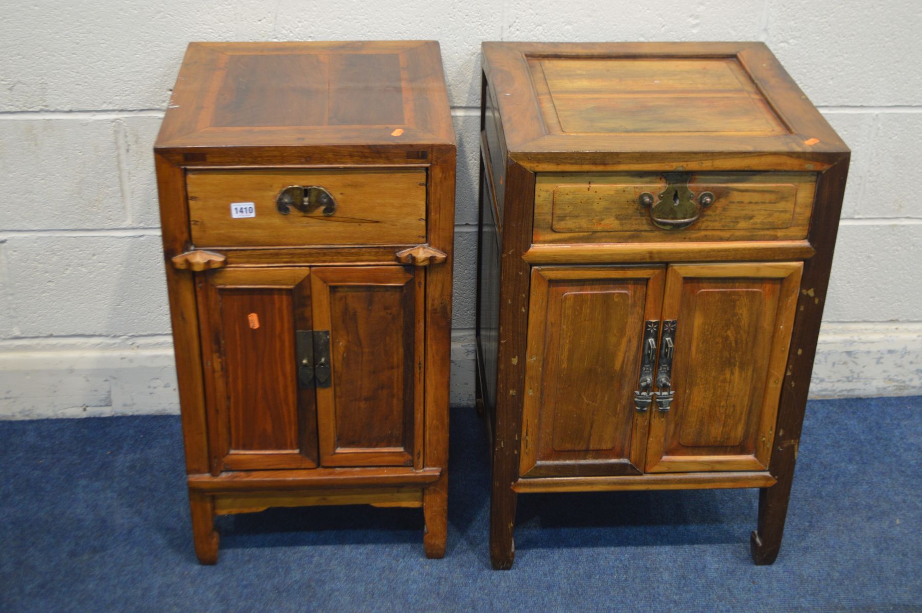 TWO SINGLE INDONESIAN HARDWOOD TWO DOOR CABINETS, with a single drawer, largest size cabinet size,