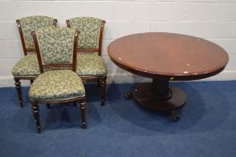 A VICTORIAN MAHOGANY CIRCULAR TILT TOP BREAKFAST TABLE, on an octagonal support and large claw feet,