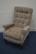 A SHERBORNE UPHOLSTERED WING BACK ARMCHAIR