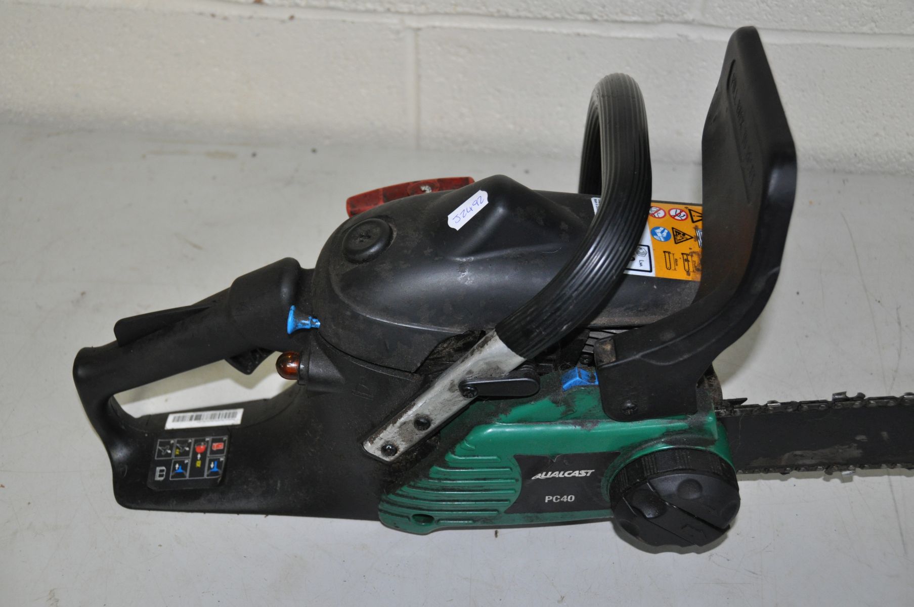 A QUALCAST PC40 PETROL CHAINSAW with 40cm cut ( engine pulls freely but hasn't been started) - Image 2 of 3
