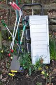 AN ALUMINIUM FOLDING WHEELCHAIR RAMP together with a small set of step ladders, garden spade, rake