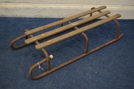 A VINTAGE TUBULAR AND WOODEN SLEIGH, marked Lew-Ways ltd