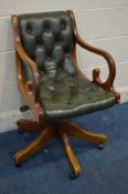 A YEWWOOD AND BUTTONED GREEN LEATHER SWIVEL OFFICE CHAIR