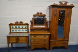 AN EDWARDIAN SATINWOOD THREE PIECE BEDROOM SUITE, comprising a mirrored single door wardrobe above a