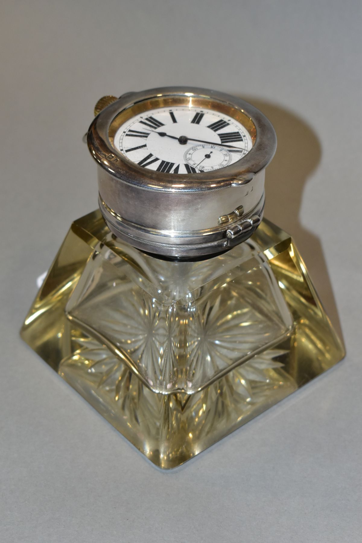 AN EDWARDIAN SILVER MOUNTED GLASS INKWELL/GOLIATH POCKET WATCH STAND, circa 1906, the hinged cover - Image 2 of 10