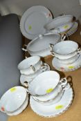 A ROYAL ALBERT VAL D'OR PART DINNER SERVICE, comprising seven soup bowls and six saucers, an oval