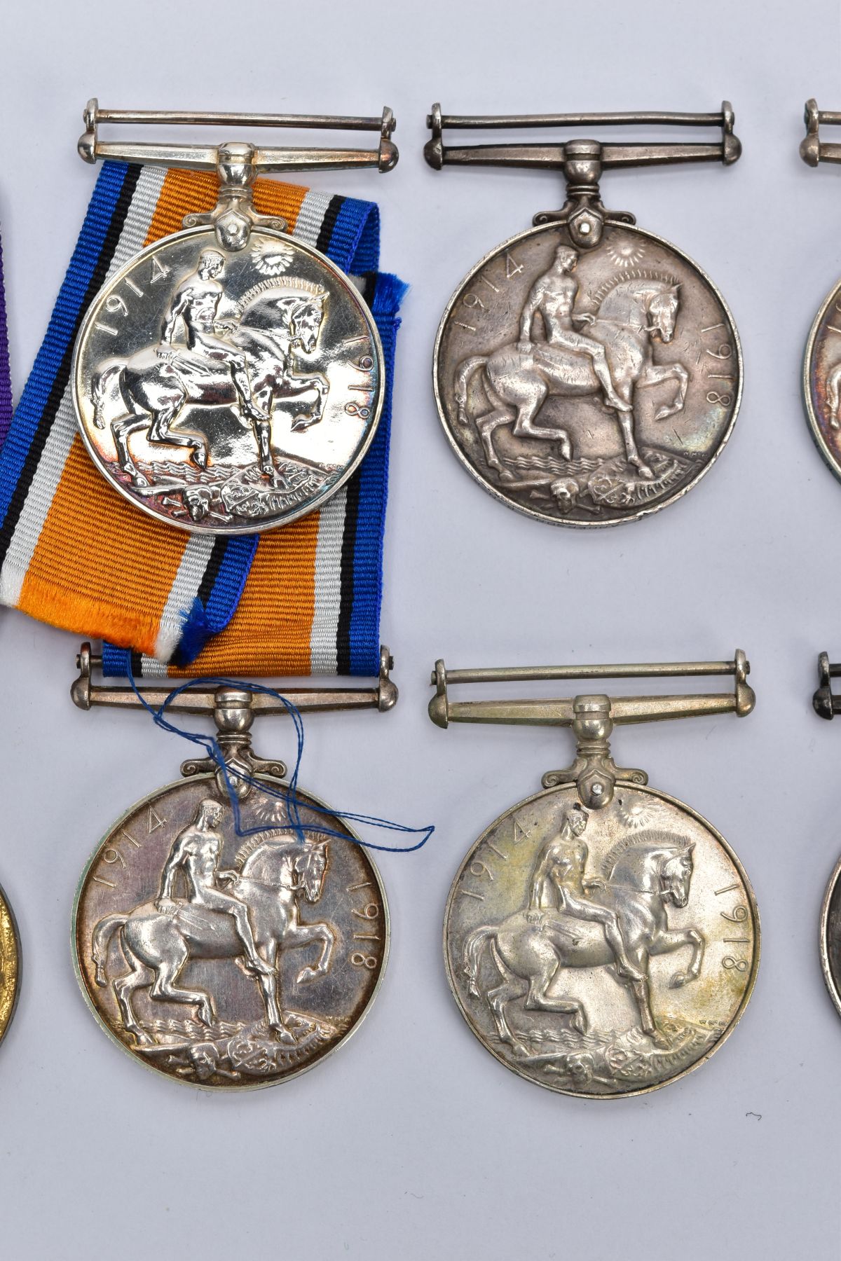 A SMALL COLLECTION OF BRITISH WWI MEDALS, comprising of a British War & Victory medals named J.52444 - Image 7 of 11